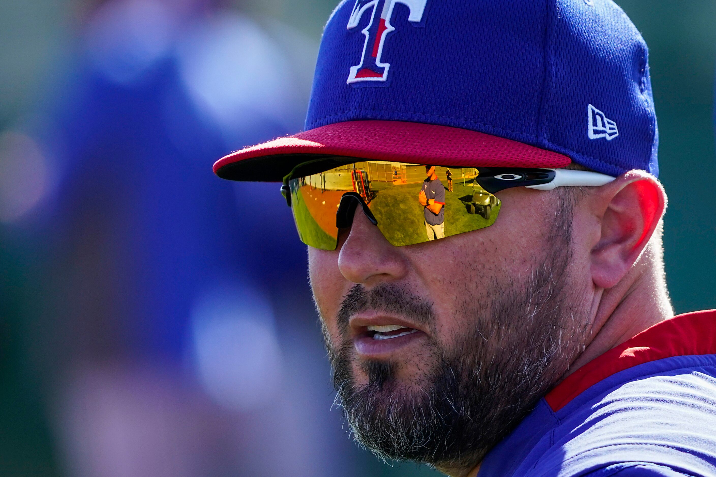 Texas Rangers AA Frisco manager Bobby Wilson watches pitchers work in the bullpen during a...