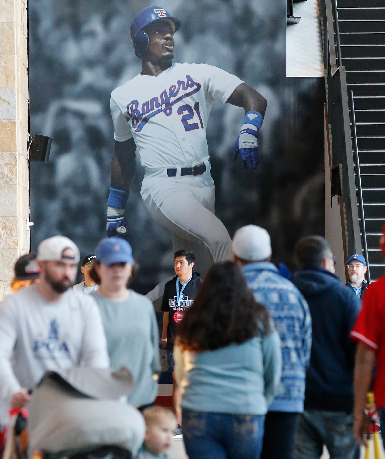 Fans pass through the stadium as they come and go during the Rangers Fan Fest which was held...