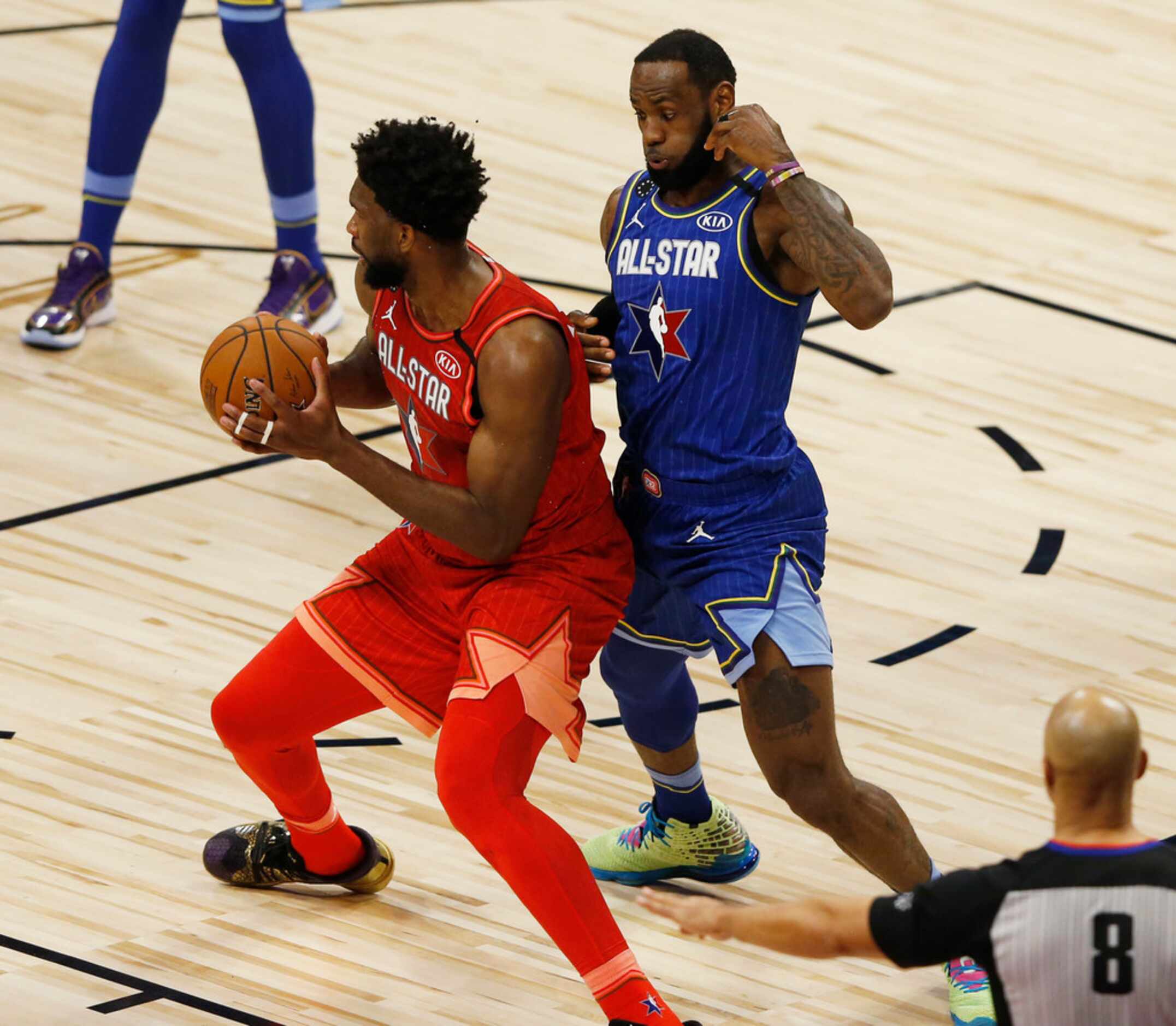 Team Giannis' Joel Embiid (24) posts up Team LeBron's LeBron James (2) during the second...