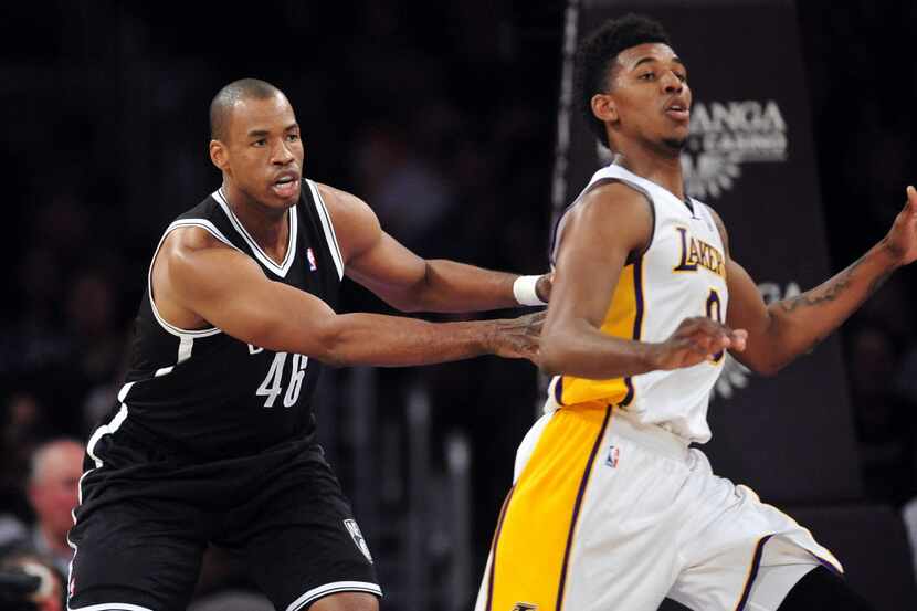 Brooklyn Nets center Jason Collins (46) defends against Los Angeles Lakers small forward...
