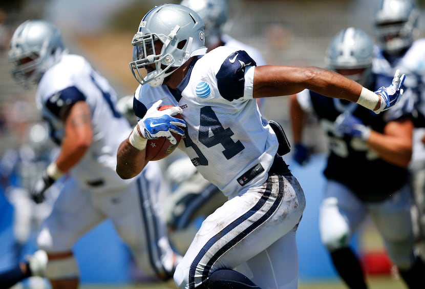 Dallas Cowboys running back Darius Jackson (34) finds running room over the left side during...