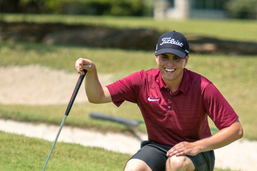 Plano's Tommy Boone lines up his putt on the 18th green during the final round of the UIL...