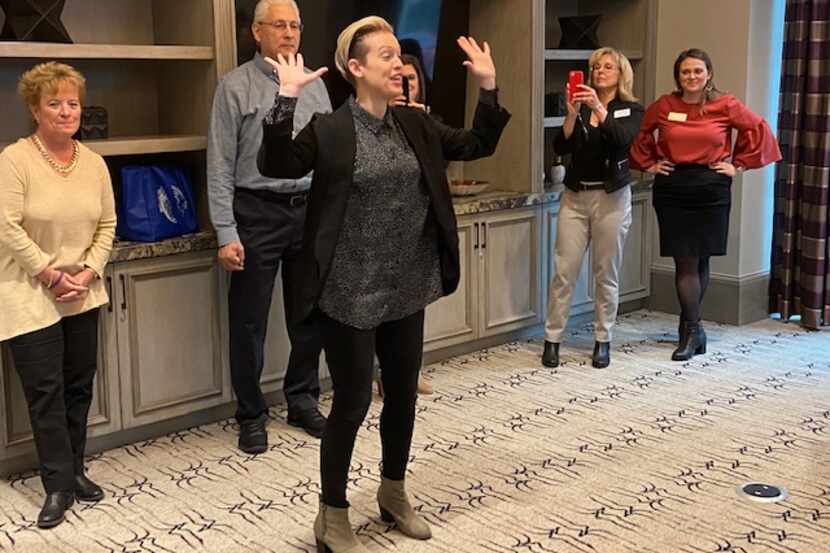 Lindsey Goldsapp of Stomping Ground Comedy Theater leads a workshop for caregivers at the...