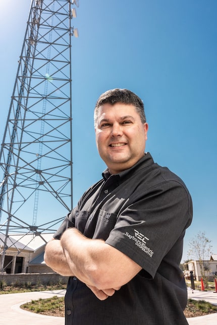 David Naylor, president and CEO of Rayburn Electric Cooperative, poses in front of an...