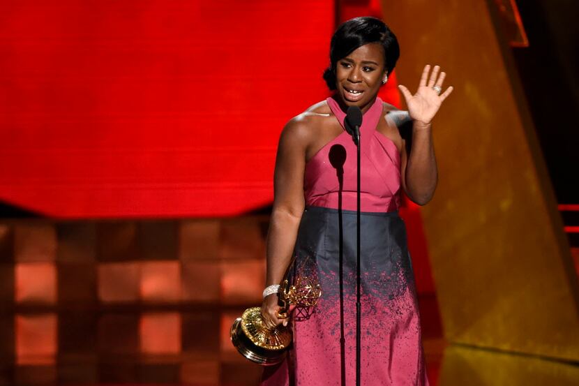  Uzo Aduba accepts the award for outstanding supporting actress in a drama series for...