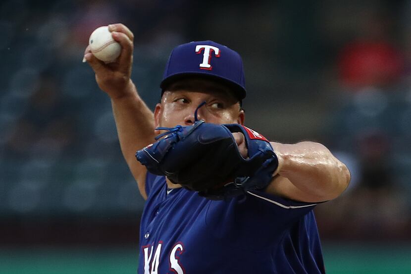 ARLINGTON, TX - SEPTEMBER 05:  Bartolo Colon #40 of the Texas Rangers throws against the Los...