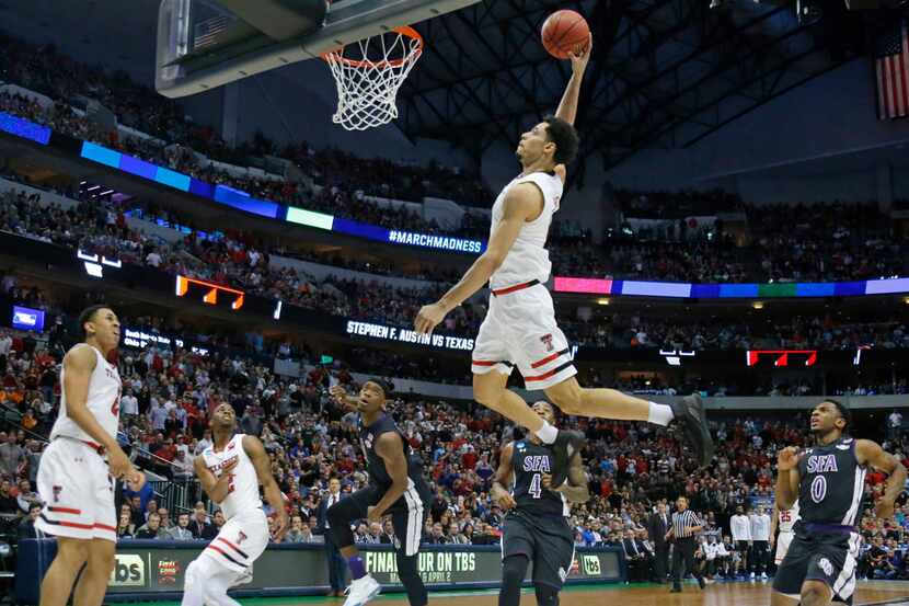 Texas Tech's Zach Smith (11) flies in for a dunk attempt in the second half against Stephen...