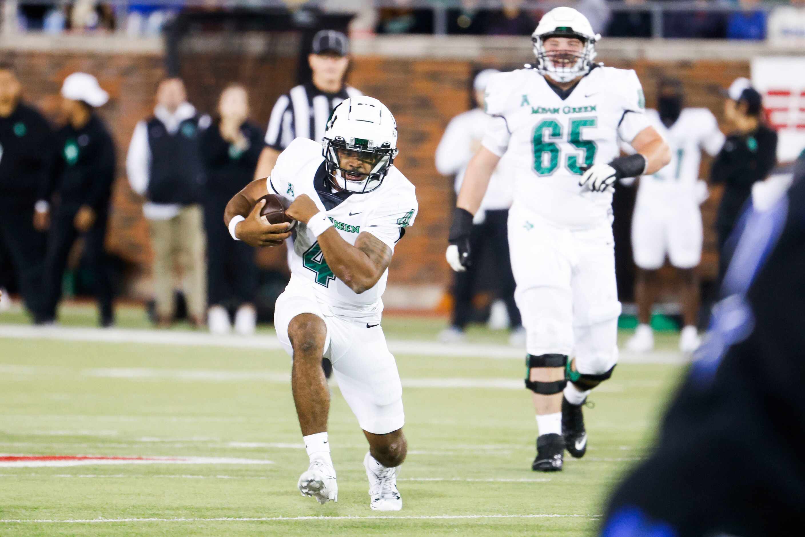 North Texas Mean Green quarterback Chandler Rogers runs with the ball against Southern...