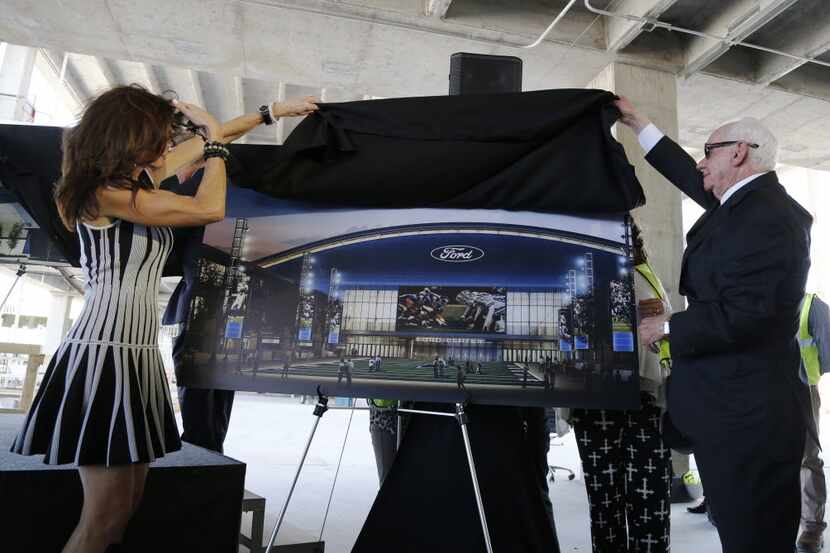 Dallas Cowboys executive vice president Charlotte Jones Anderson and Ford dealer Sam Pack...