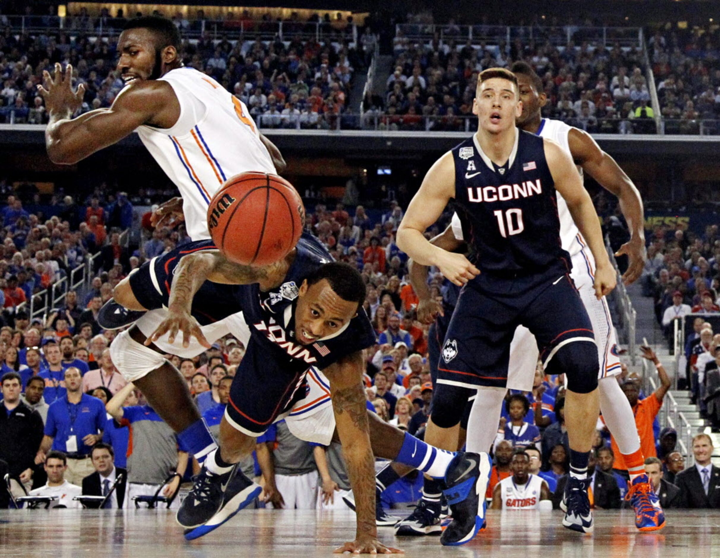 Skip Olander, father of Connecticut Huskies player Tyler Olander (right), expects to shell...