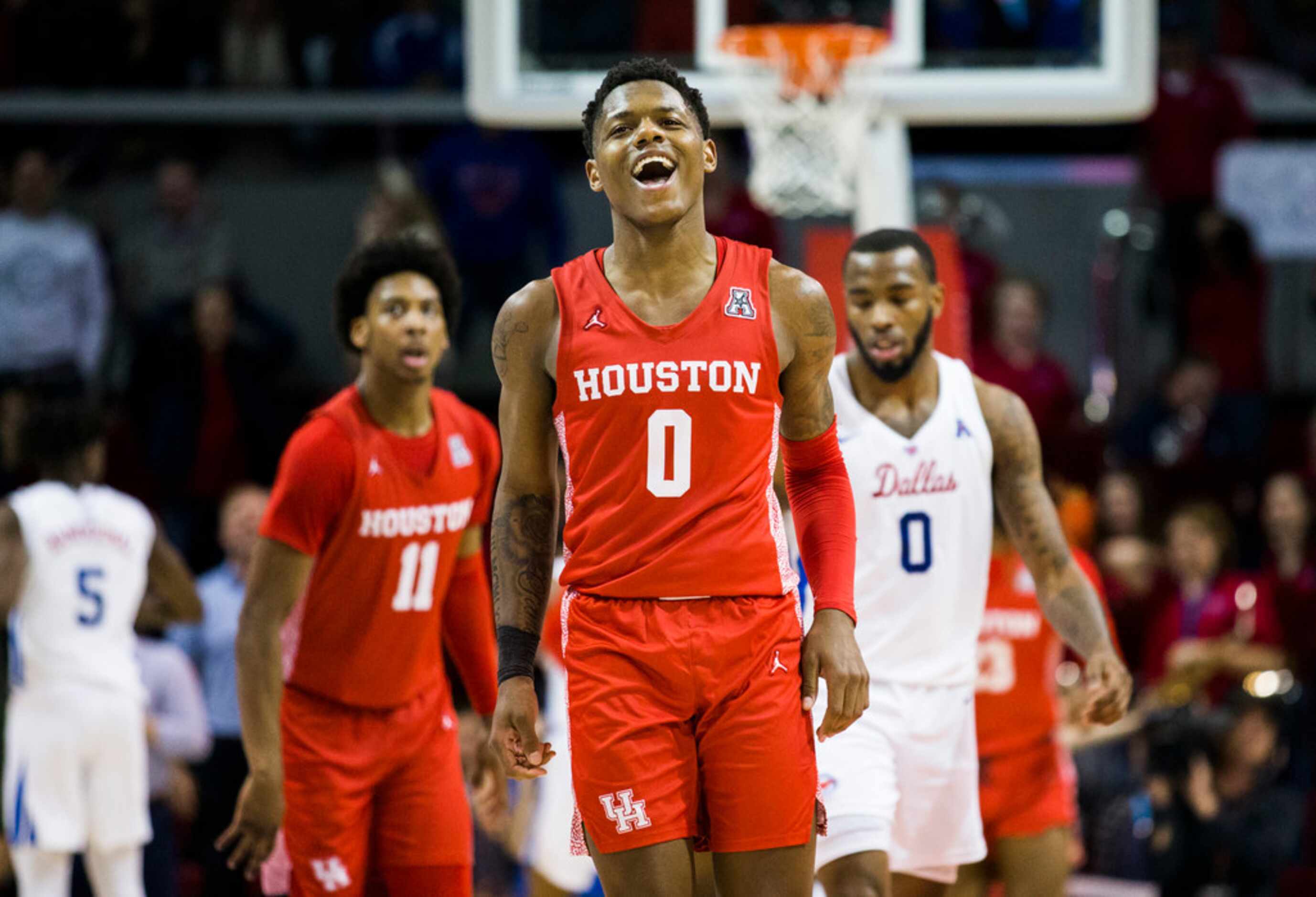 Houston Cougars guard Marcus Sasser (0) celebrates a three pointer during overtime of a...