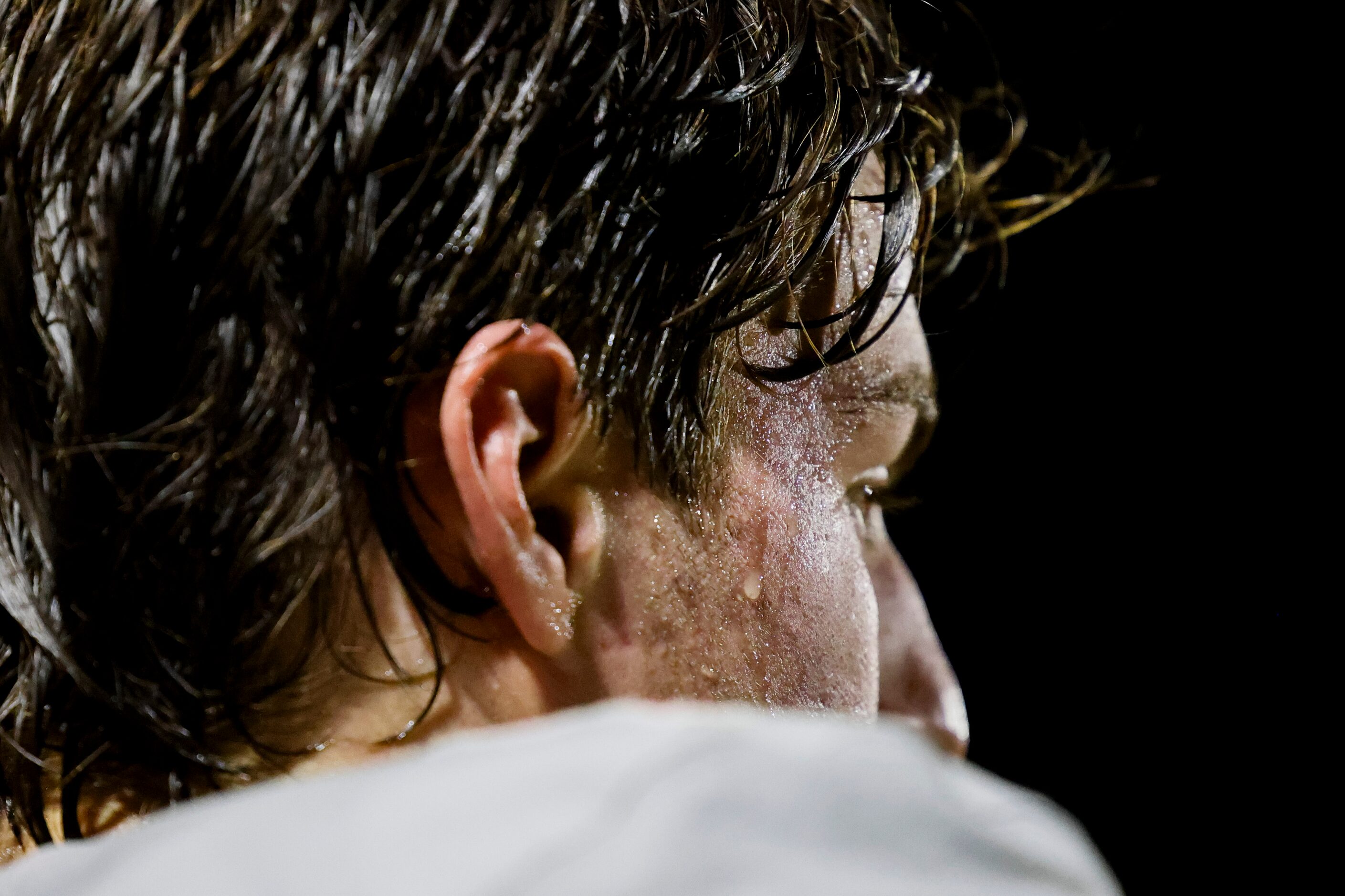 Woodrow Wilson’s QB Cam McGuire takes a breather on the bench during the second half of a...