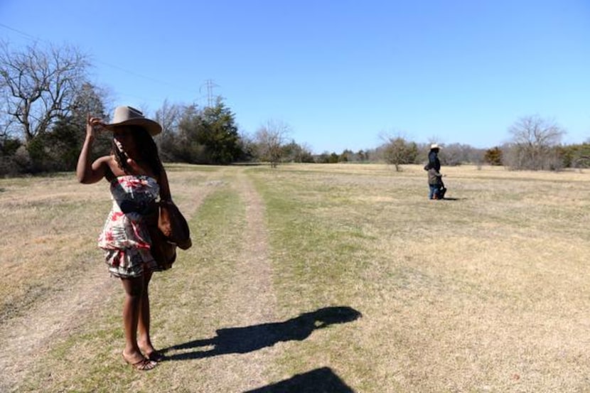 Katrina Poitier stands at the trailhead of the recently named Cleo Hearn Equestrian Trail at...