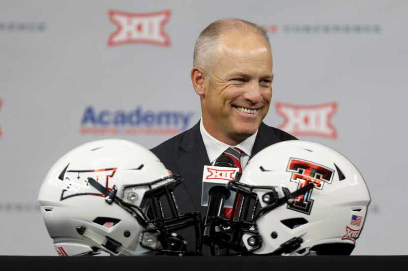 Texas Tech head football coach Matt Wells reacts during the Big 12 Conference Media Days at...