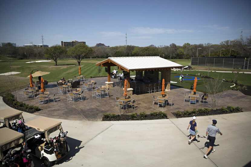 An outdoor seating area sits near the golf course at The Clubs of Prestonwood. (File...