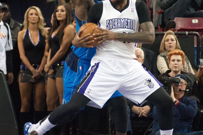 Dec 9, 2013; Sacramento, CA, USA; Sacramento Kings center DeMarcus Cousins (15) pivots to...