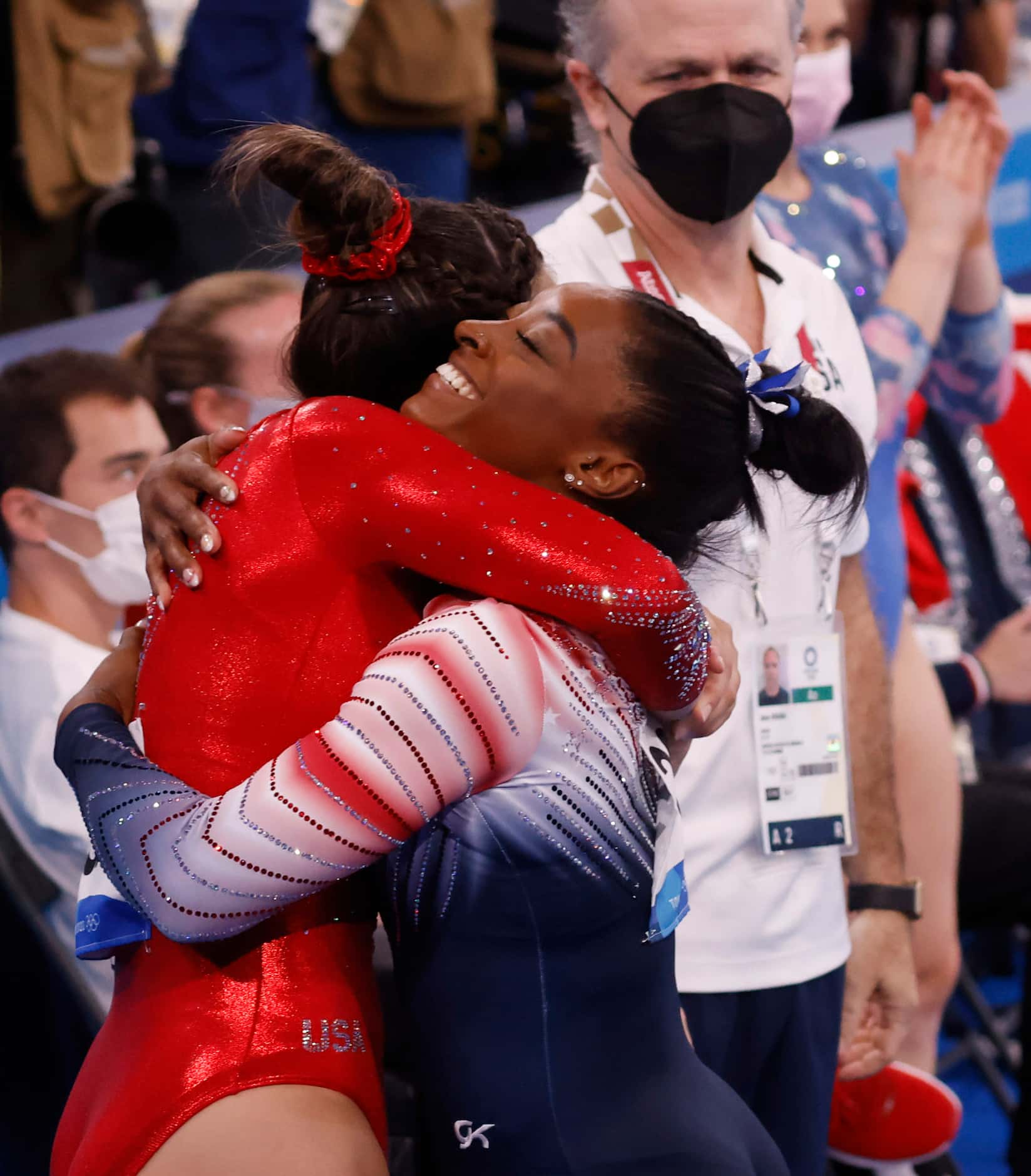 USA’s Simone Biles gets a hug from her teammate Sunsia Lee after competing in the women’s...