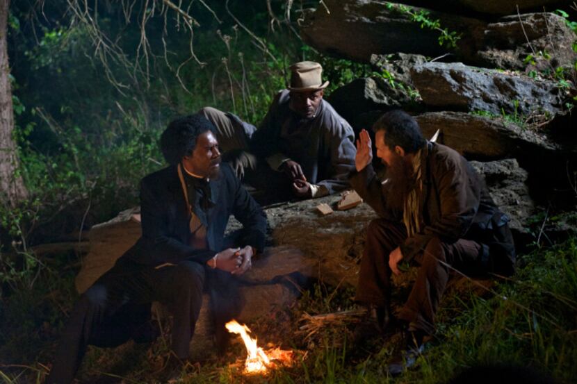 John Brown, played by T. Ryder Smith (right), tries to persuade Frederick Douglass (Richard...