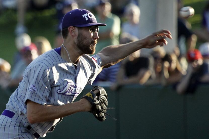 TCU starting pitcher Matt Purke throws a pitch in the first inning during the TCU Horned...