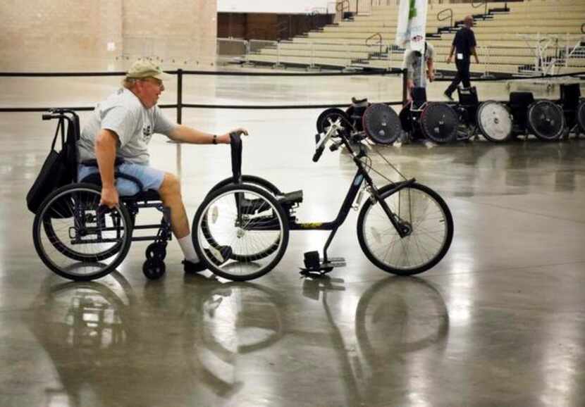 
Bill Wyland helps set up for the Baylor Institute for Rehabilitation’s WCMX No Excuses...