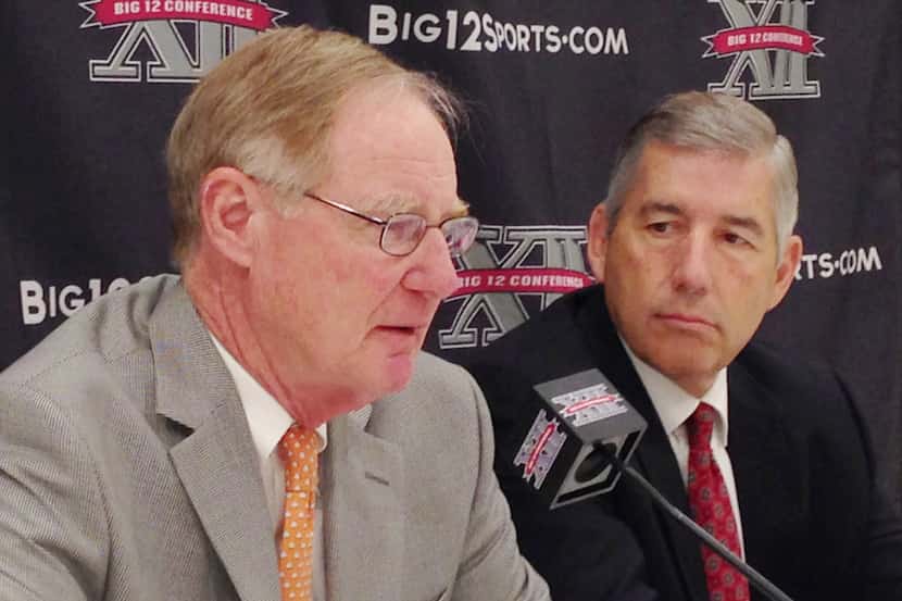 Oklahoma State President and Chairman of the Big 12 board of directors Burns Hargis, left,...