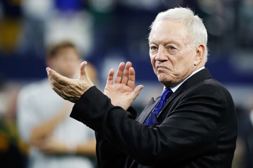 ARLINGTON, TX - JANUARY 15:  Dallas Cowboys owner Jerry Jones applauds during warm ups...