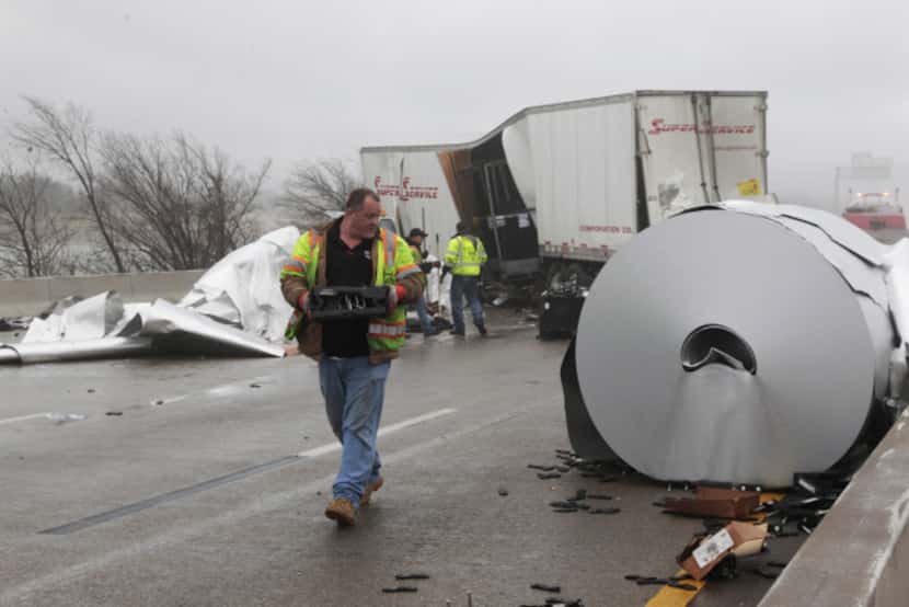 Both sides of I-30 were closed for hours Friday.