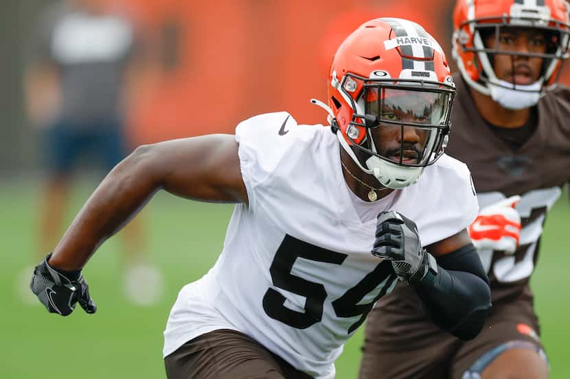 Cleveland Browns' Willie Harvey Jr. (54) takes part in drills at the NFL football team's...