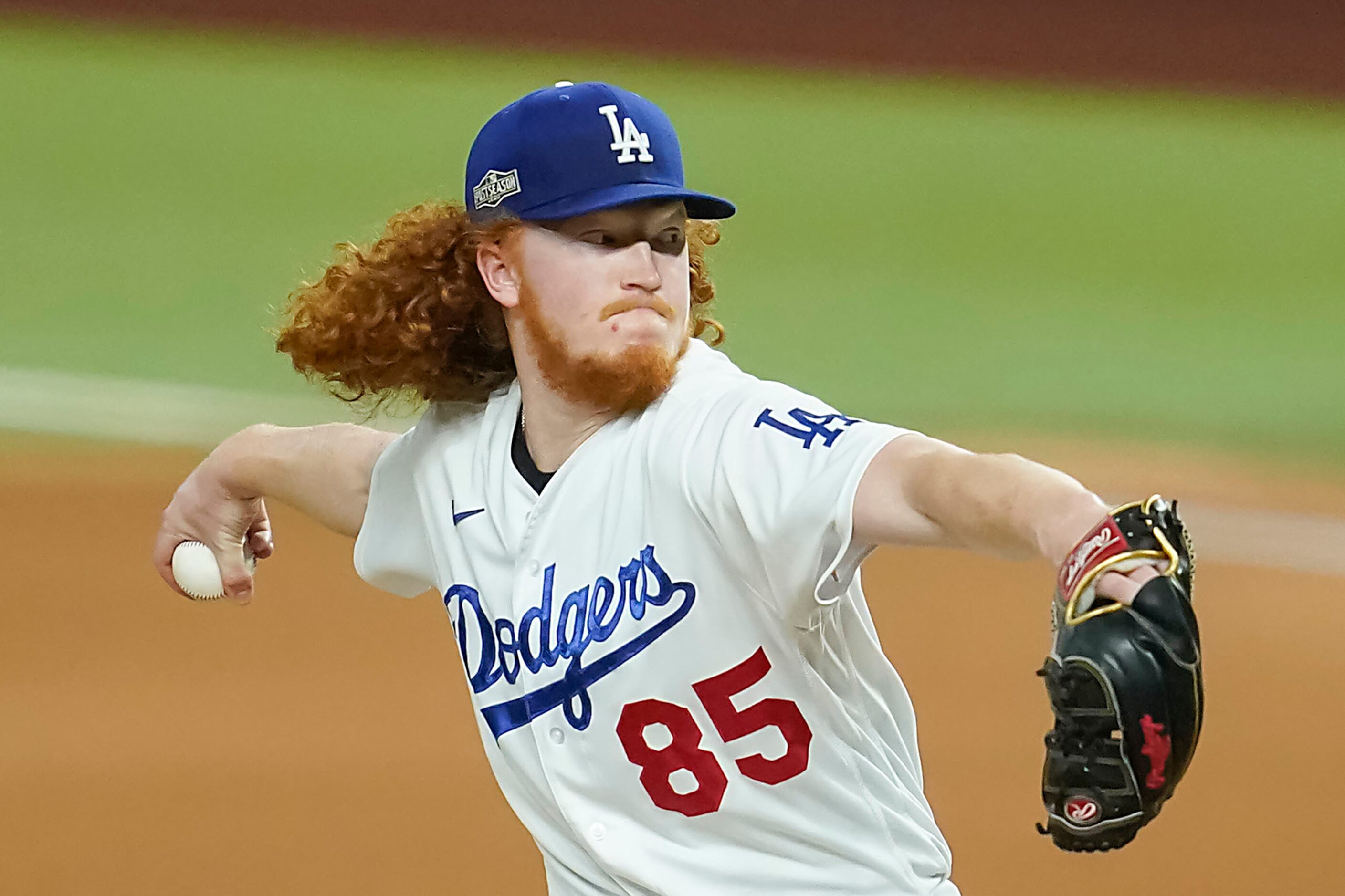 Los Angeles Dodgers starting pitcher Dustin May delivers during the first inning against the...