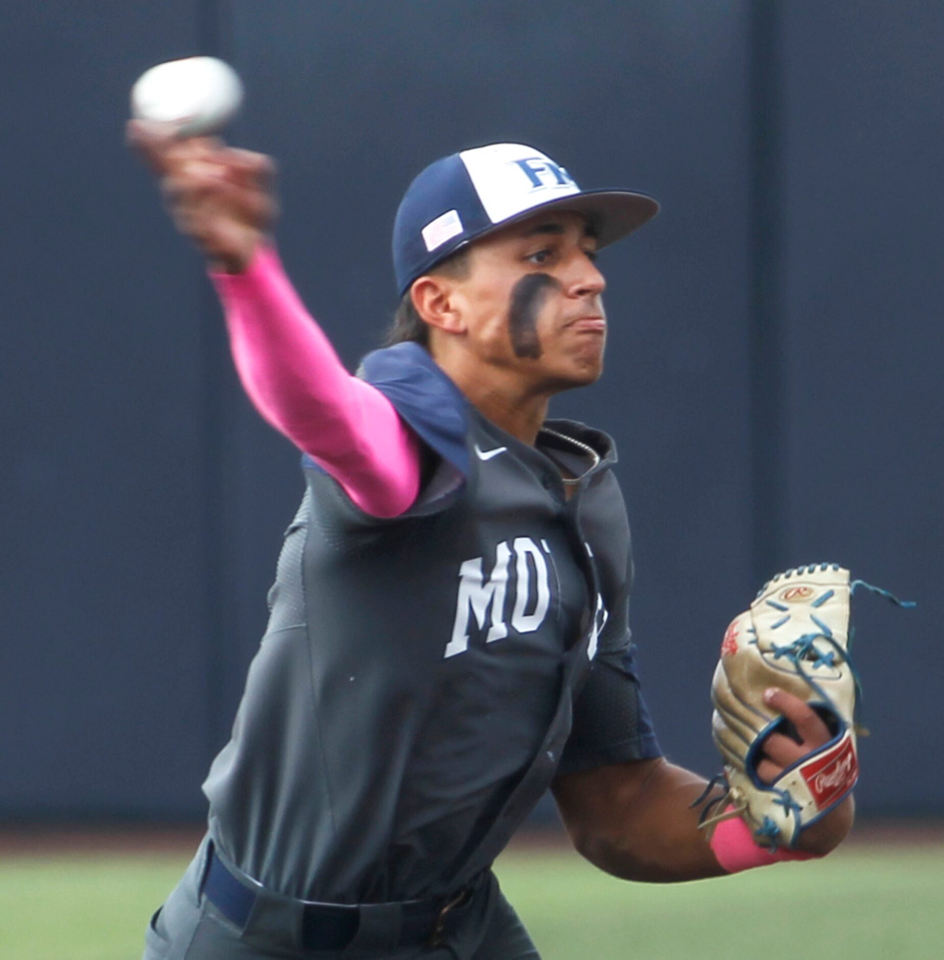 Flower Mound shortstop Adrian Rodriguez (2) throws out a Keller batter after fielding a...