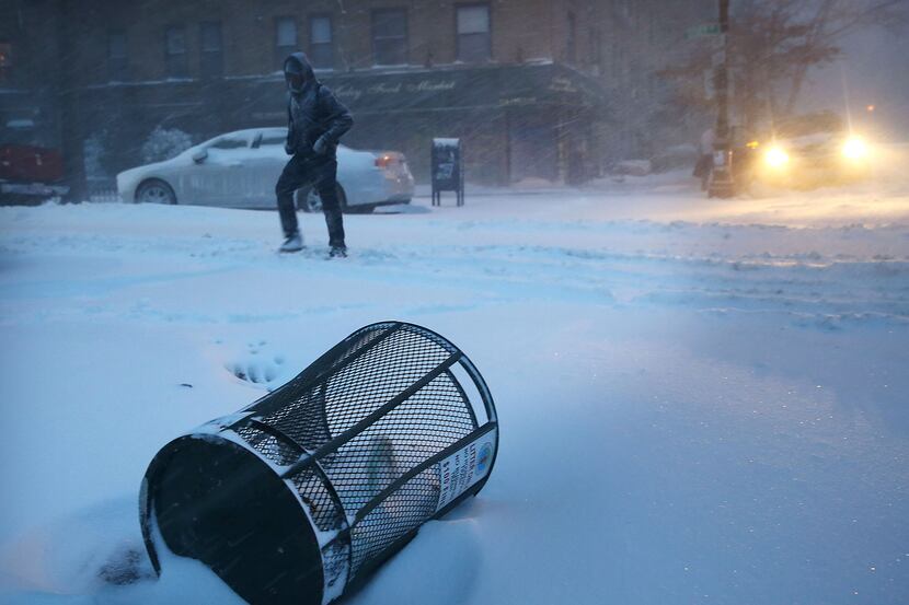  A man walks in blizzard-like conditions on January 23, 2016 in the Brooklyn borough of New...