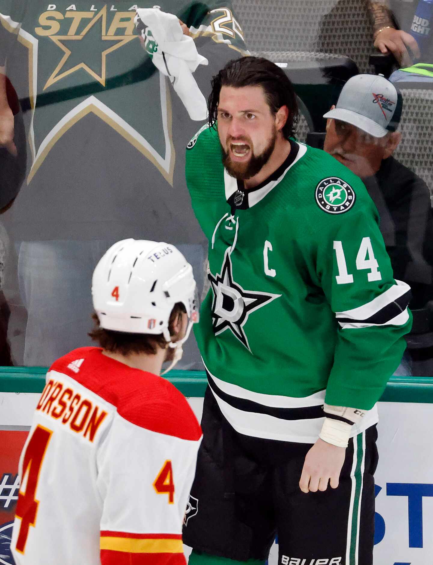 Dallas Stars left wing Jamie Benn (14) yells across the ice before heading to the penalty...