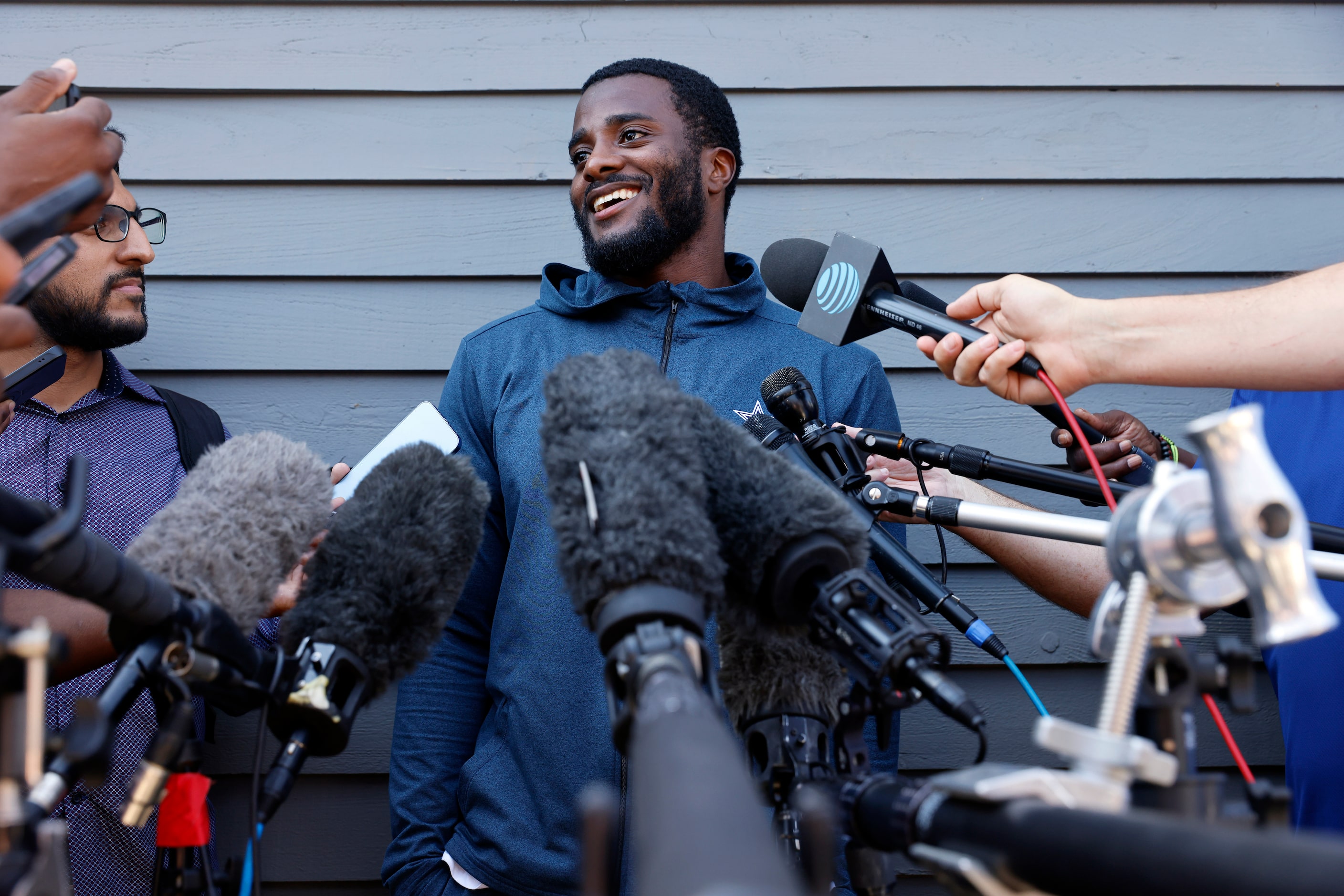 Dallas Cowboys cornerback Jourdan Lewis answers questions from the media after arriving with...