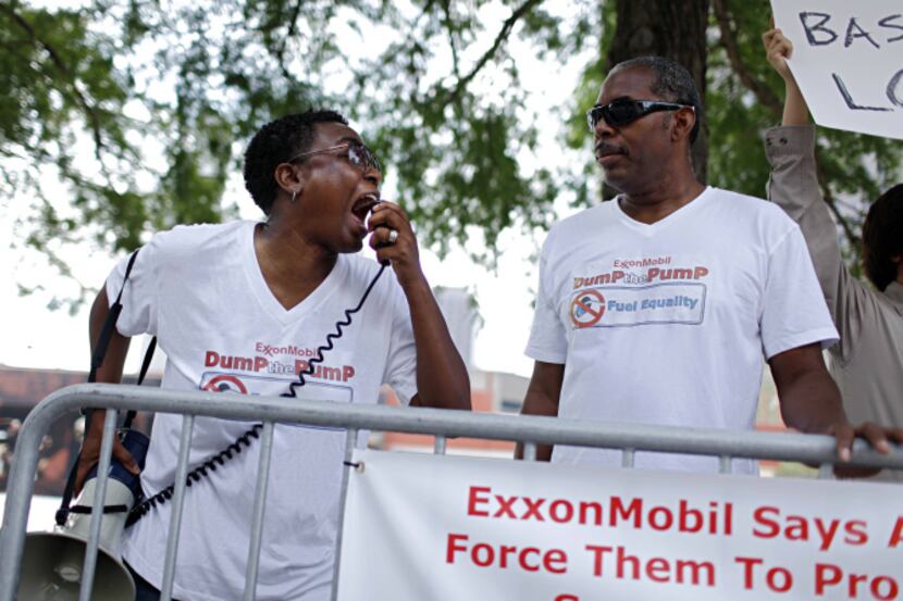 C.D. Kirven (left) screamed into a megaphone alongside Michael Robinson during a GetEQUAL...