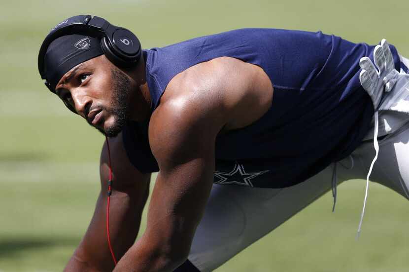 Dallas Cowboys strong safety Barry Church (42) stretches before a game against the...