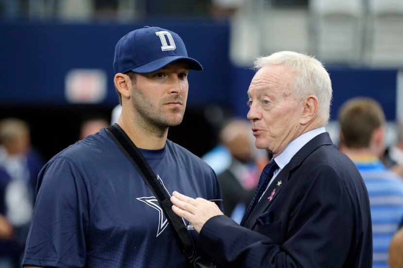 This Oct. 11, 2015 photo shows Dallas Cowboys owner Jerry Jones, right, talking with...