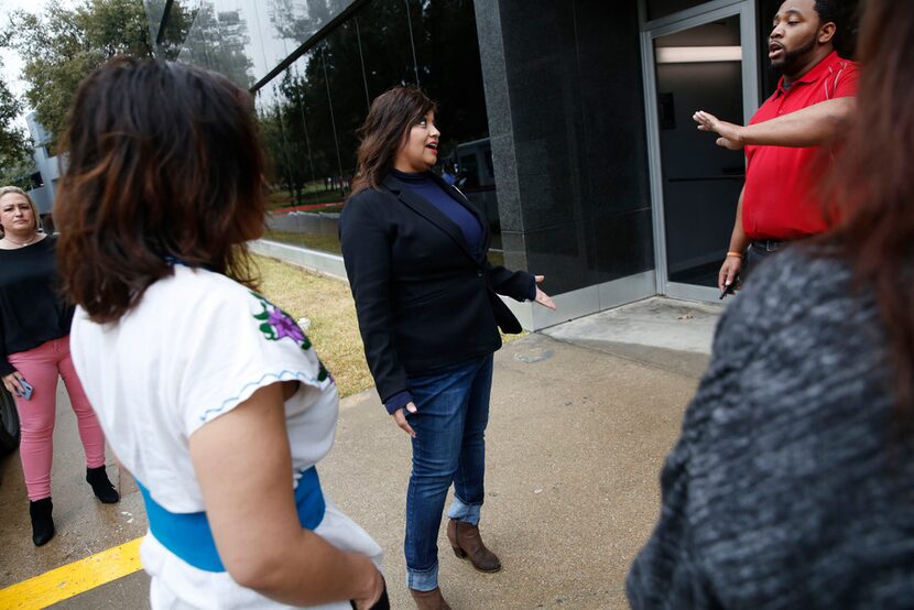 Mandy Watkins of the Beyond Baseball Youth Association is stopped by security on her way to...