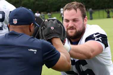 Dallas Cowboys offensive lineman Cooper Beebe (56) works through a hand-eye coordination...