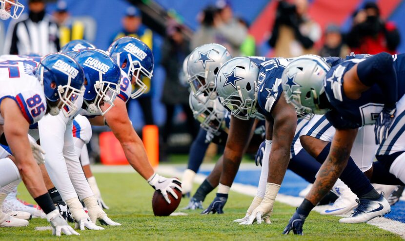 The New York Giants offensive line squares off against the Dallas Cowboys defensive line...