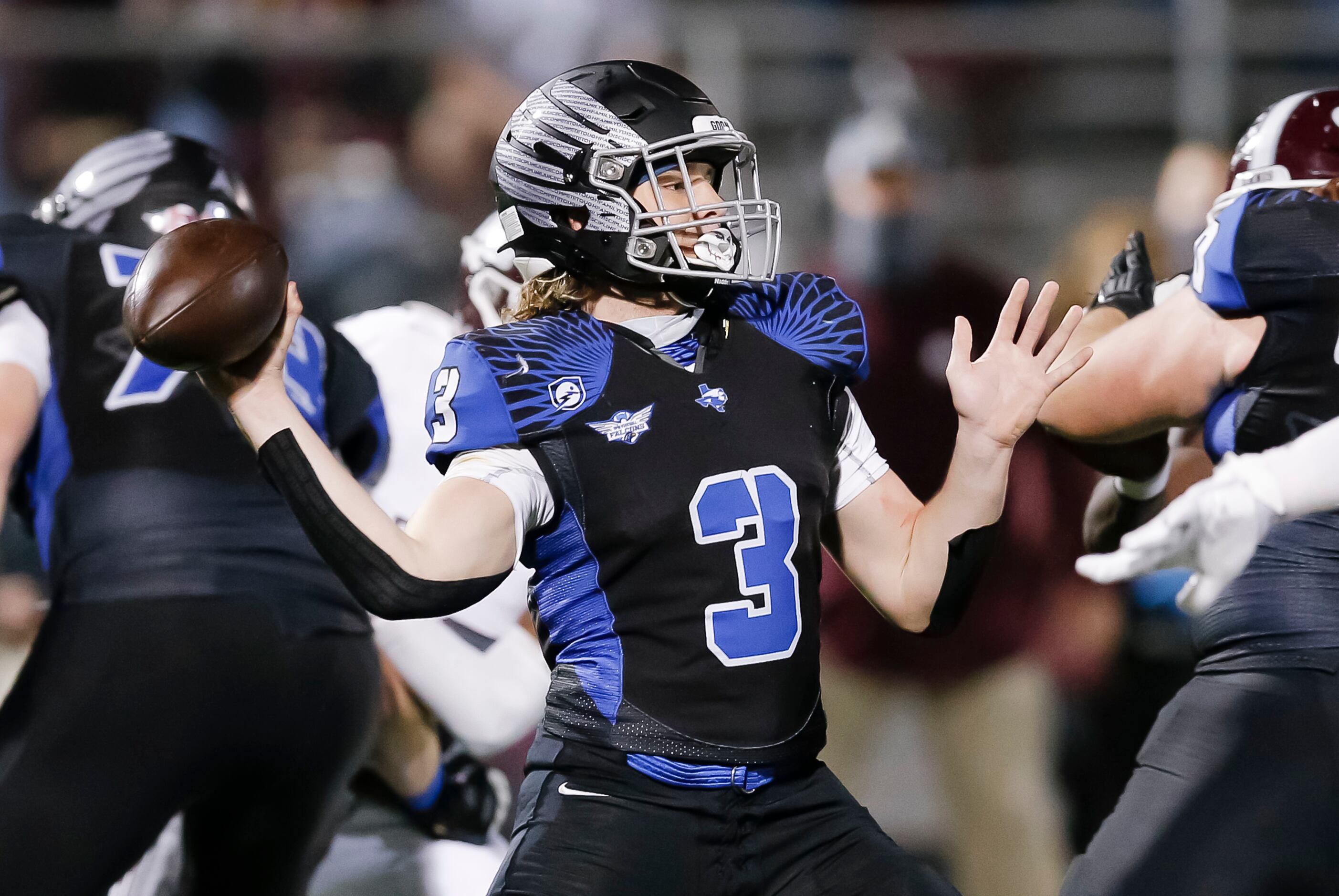 North Forney senior quarterback Jacob Acuna throws during the first half of a high school...