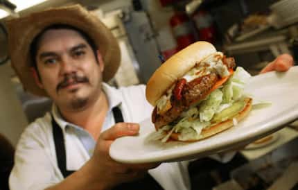 This DMN File photo shows the Diablo Burger, which is still on the menu today. It has...