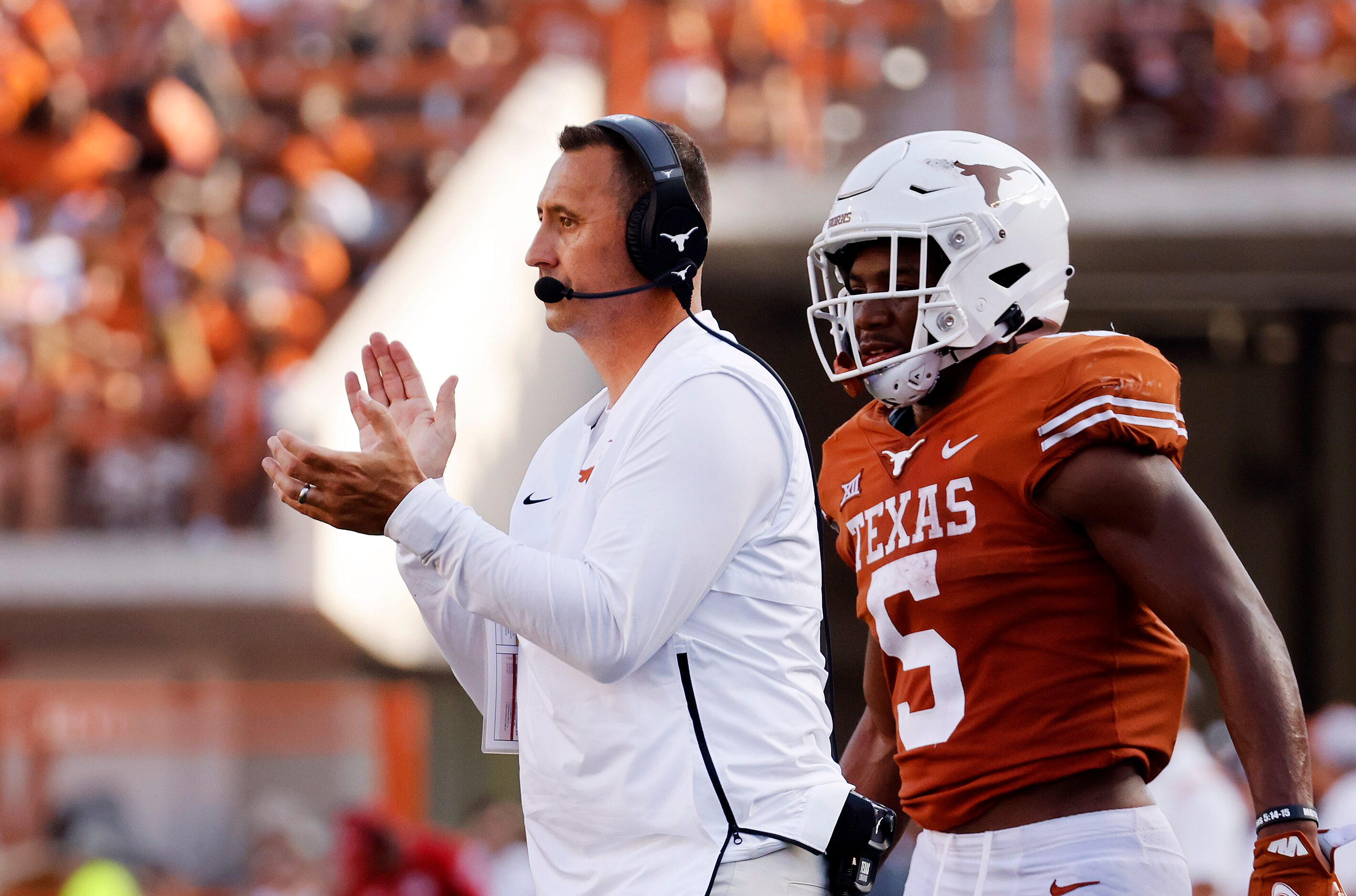 Texas Longhorns head coach Steve Sarkisian applauds his players as they faced the...