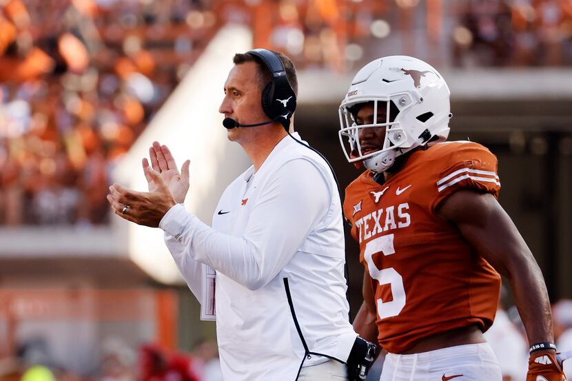 Texas Longhorns head coach Steve Sarkisian applauds his players as they faced the...