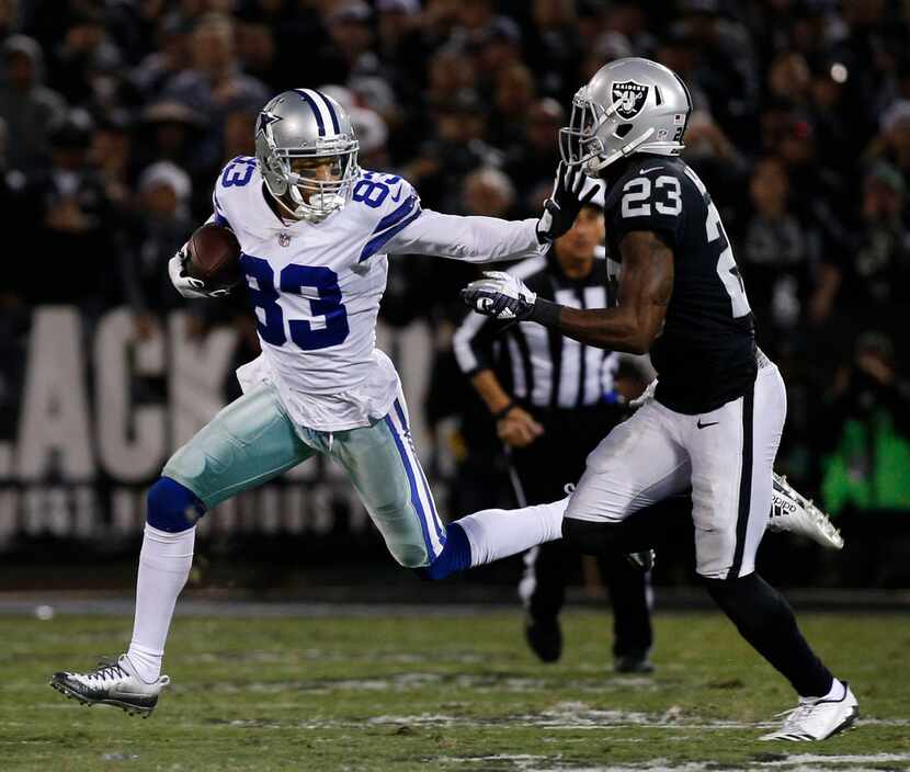 Dallas Cowboys wide receiver Terrance Williams (83) runs the ball against Oakland Raiders...