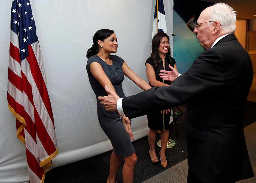 Congressional candidate Katrina Pierson greets Rafael Cruz, father of Senator Ted Cruz, as...