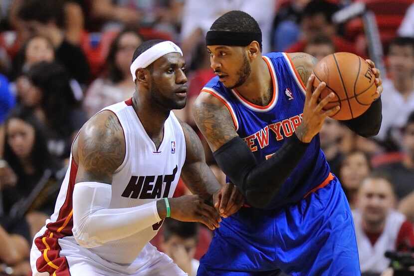 Apr 6, 2014; Miami, FL, USA; New York Knicks forward Carmelo Anthony (7) is pressured by...