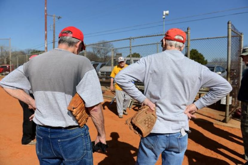 Left: Irving Eagles players Art Latimer, 82, (left) and Dick Chaney, 80, listen to manager...