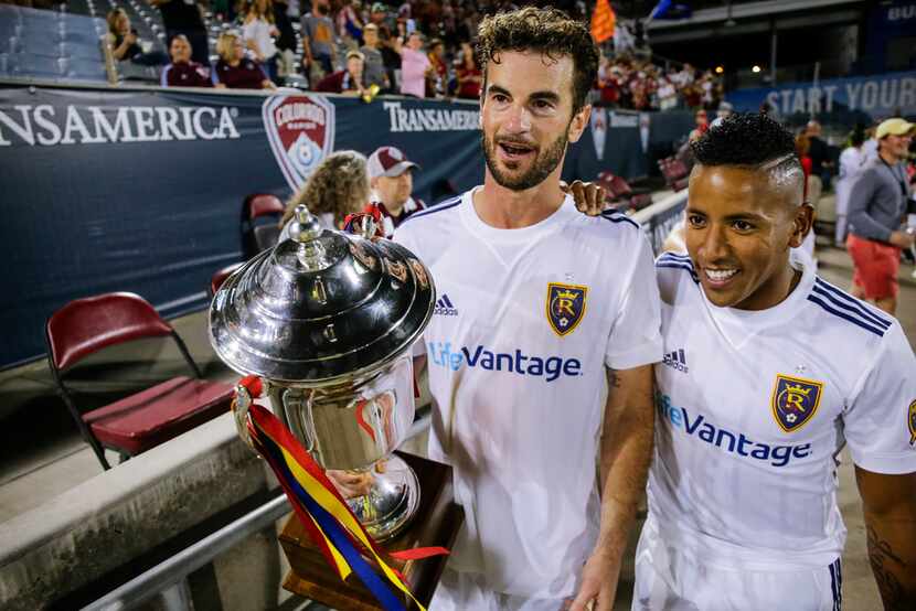 Real Salt Lake midfielder Kyle Beckerman, left, and Joao Plata (10) carry the Rocky Mountain...