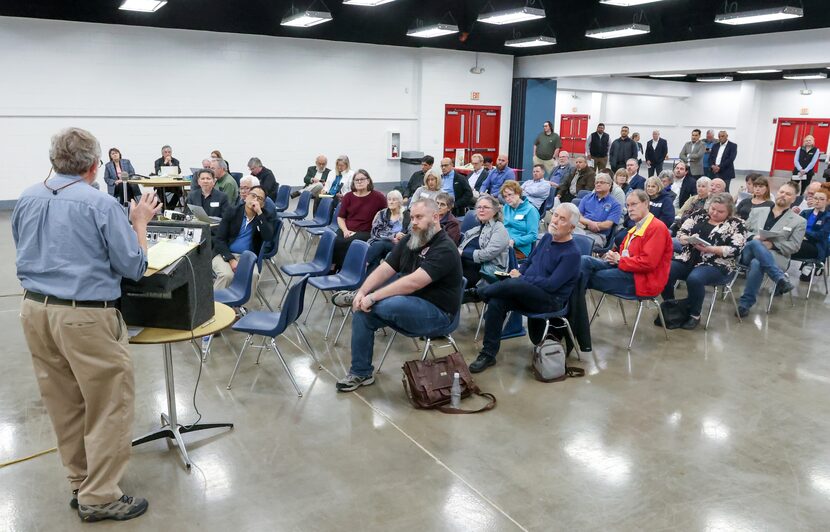 Lon Burnam (left), a former Texas state representative for Fort Worth, speaks during the...