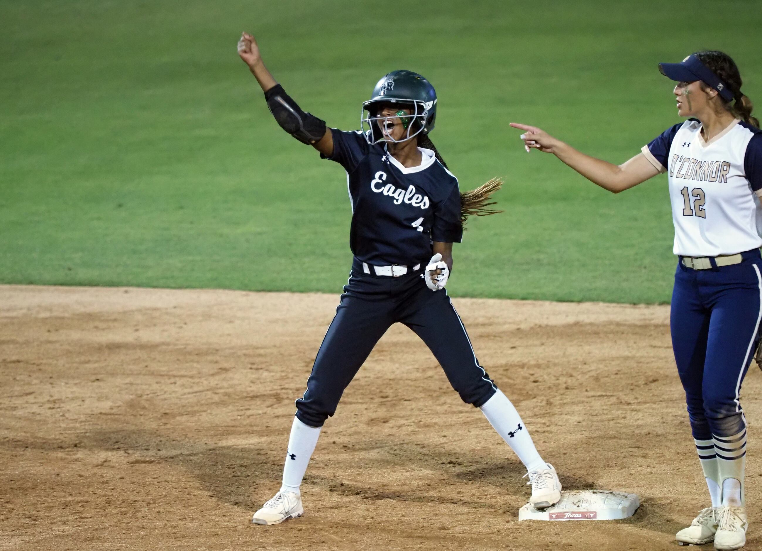 Mansfield Lake Ridge baserunner Kassidy Chance (left) reacts after a double against...